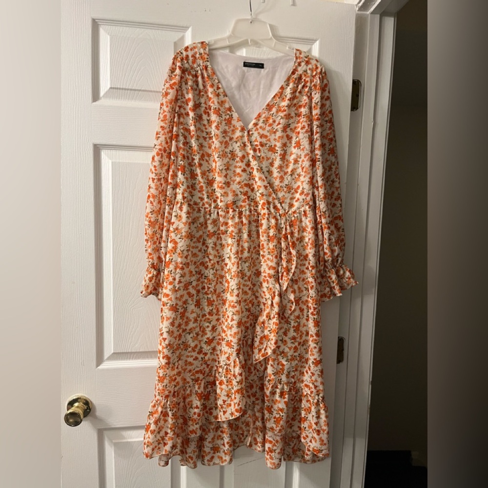 Misses springtime long sleeve high/ low ruffle bottom dress with elastic waist